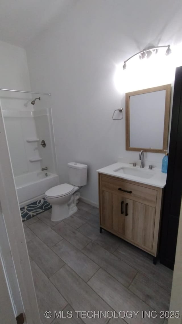 21316 County Road 502, Colcord, OK 74338 - full bathroom with vanity, toilet, and bathtub / shower combination