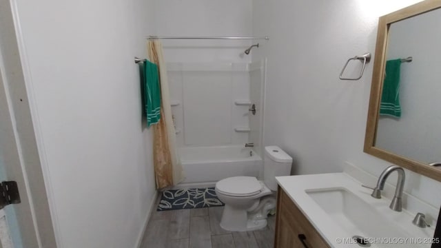 21316 County Road 502, Colcord, OK 74338 - bathroom featuring toilet, shower / tub combo with curtain, vanity, and wood finished floors
