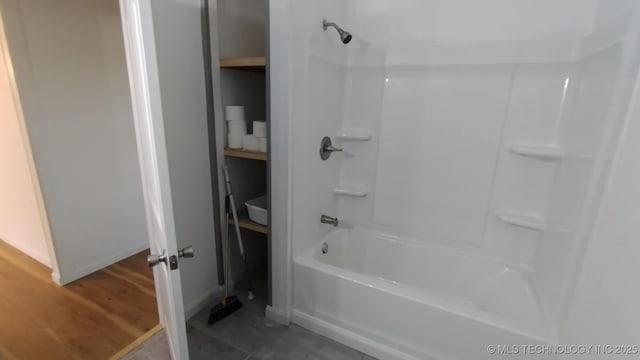 21316 County Road 502, Colcord, OK 74338 - full bath with shower / tub combination and baseboards
