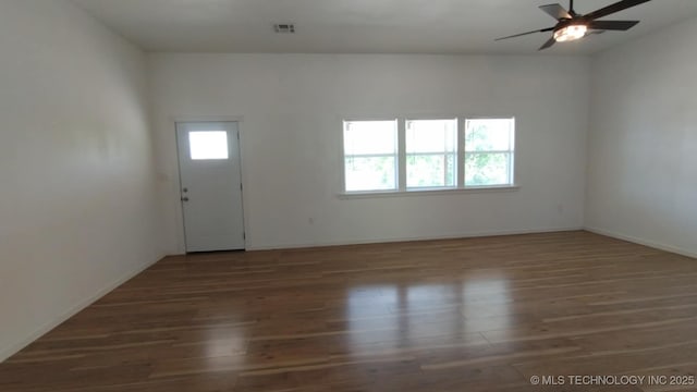 21316 County Road 502, Colcord, OK 74338 - interior space with visible vents, wood finished floors, baseboards, and ceiling fan