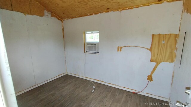 21316 County Road 502, Colcord, OK 74338 - empty room featuring cooling unit and wood finished floors