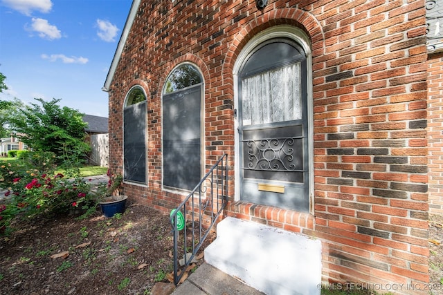 1731 S Florence Pl, Tulsa, OK 74104 - doorway to property with brick siding