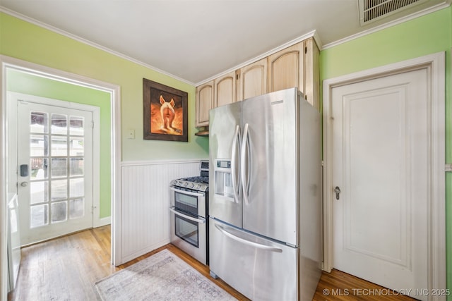 1731 S Florence Pl, Tulsa, OK 74104 - kitchen featuring crown molding, light brown cabinets, visible vents, and appliances with stainless steel finishes