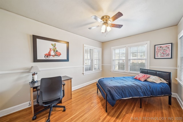 1731 S Florence Pl, Tulsa, OK 74104 - bedroom featuring baseboards, a ceiling fan, and wood finished floors