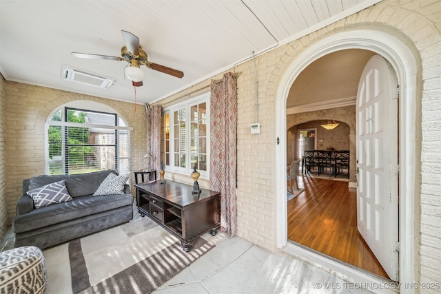 1731 S Florence Pl, Tulsa, OK 74104 - sunroom / solarium featuring arched walkways