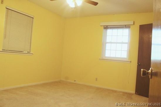 107 S 10th, Davis, OK 73030 - spare room with a ceiling fan and light carpet