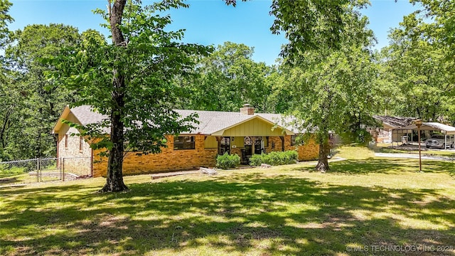 1603 Skyline, Durant, OK 74701 - ranch-style house featuring brick siding and a chimney