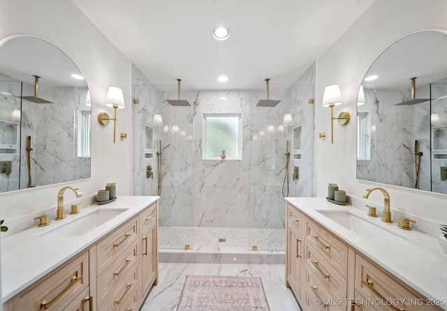 1402 E 125th St S, Jenks, OK 74037 - bathroom featuring a marble finish shower, recessed lighting, two vanities, and marble finish floors