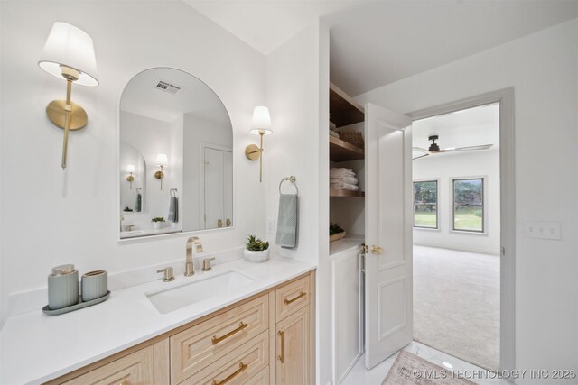 1402 E 125th St S, Jenks, OK 74037 - bathroom with a ceiling fan, vanity, and tile patterned floors