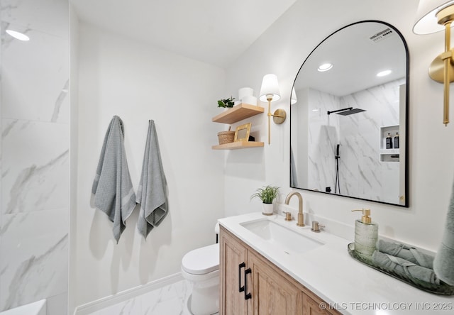 1402 E 125th St S, Jenks, OK 74037 - full bath with marble finish flooring, a marble finish shower, toilet, vanity, and baseboards