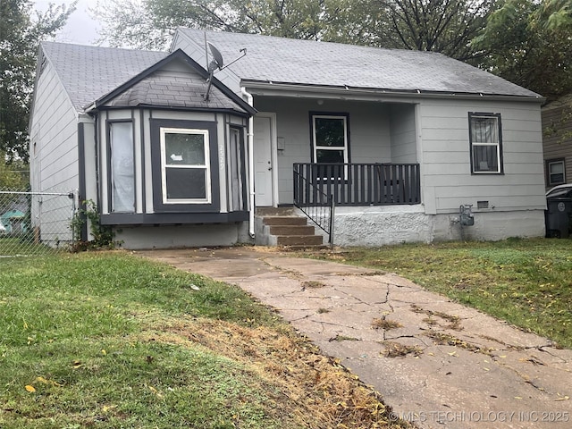 2529 N Quaker Ave, Tulsa, OK 74106 - bungalow featuring covered porch and a shingled roof