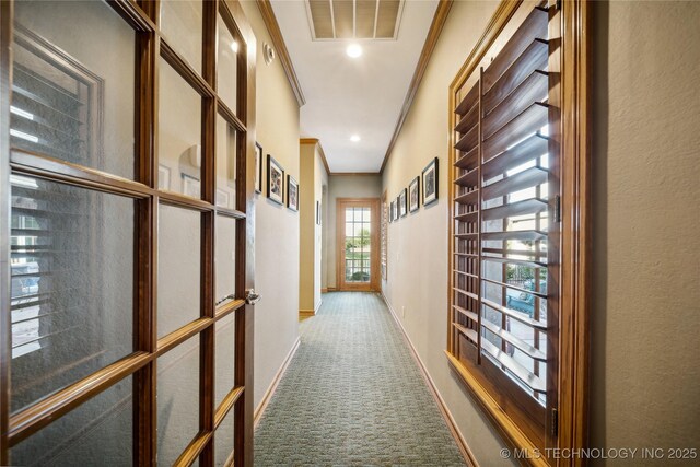 5263 Oak Leaf Dr, Tulsa, OK 74131 - hallway with ornamental molding, carpet floors, and baseboards