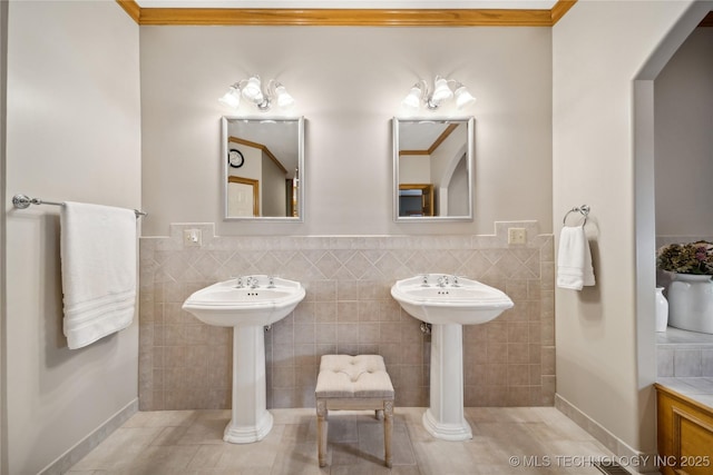 5263 Oak Leaf Dr, Tulsa, OK 74131 - bathroom with tile walls, wainscoting, and tile patterned flooring