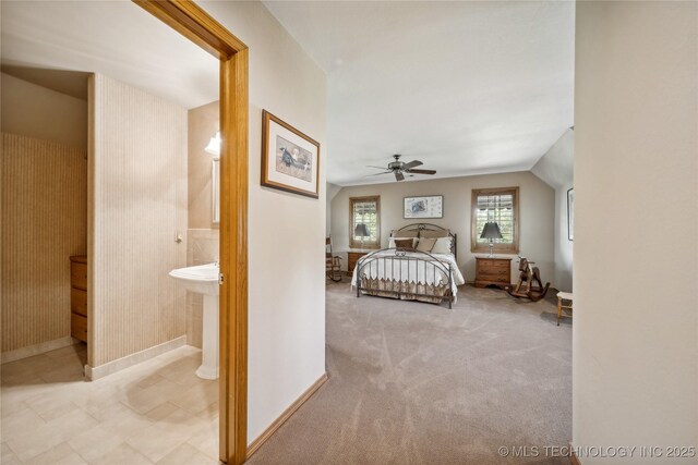 5263 Oak Leaf Dr, Tulsa, OK 74131 - bedroom featuring ensuite bathroom, baseboards, and ceiling fan
