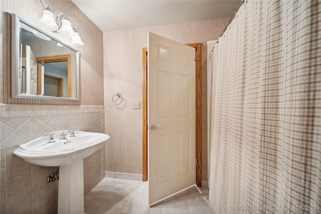5263 Oak Leaf Dr, Tulsa, OK 74131 - full bathroom featuring wallpapered walls, tile patterned floors, and tile walls
