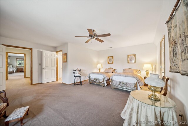 5263 Oak Leaf Dr, Tulsa, OK 74131 - bedroom with carpet flooring, a ceiling fan, and baseboards