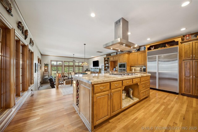 5263 Oak Leaf Dr, Tulsa, OK 74131 - kitchen featuring built in appliances, open shelves, island exhaust hood, light wood finished floors, and brown cabinets