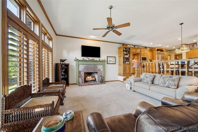 5263 Oak Leaf Dr, Tulsa, OK 74131 - carpeted living room featuring a ceiling fan, crown molding, baseboards, a fireplace, and recessed lighting
