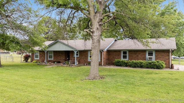 single story home with brick siding and roof with shingles