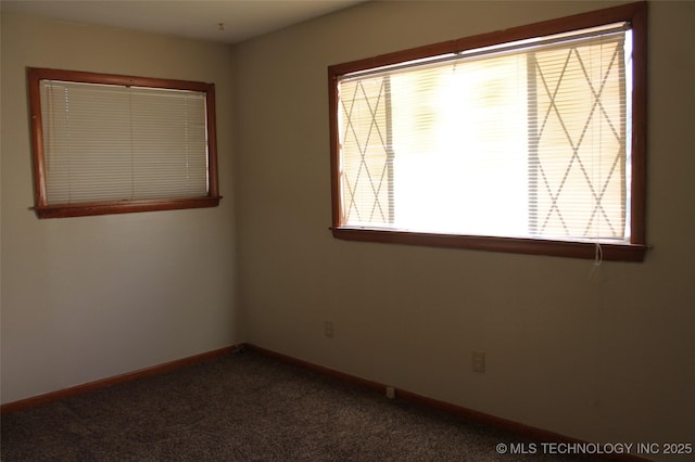 611 Kali Inla, Hartshorne, OK 74547 - empty room featuring healthy amount of natural light, baseboards, and carpet flooring