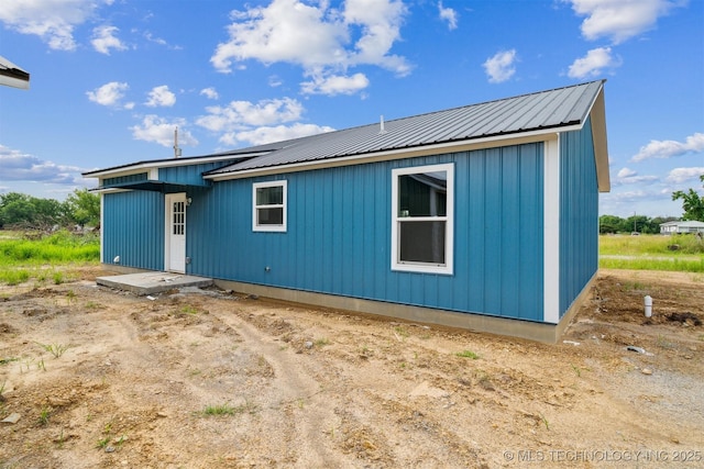 112 E Loy Ave, Chouteau, OK 74337 - view of front of home with a metal roof