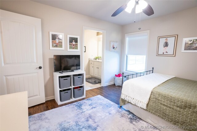 8342 N 149th E Ave, Owasso, OK 74055 - bedroom with wood finished floors, ensuite bathroom, baseboards, and ceiling fan