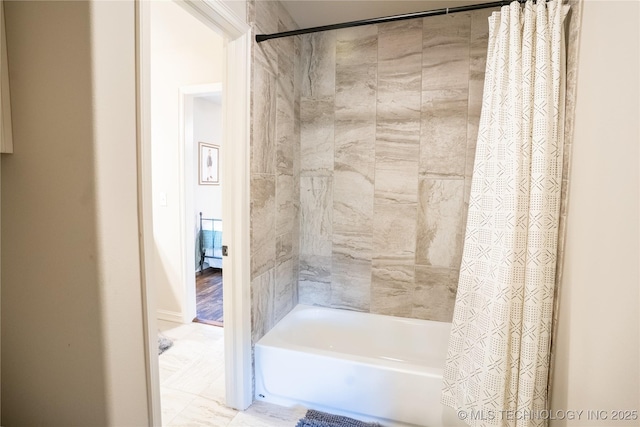 bathroom featuring shower / bath combination with curtain