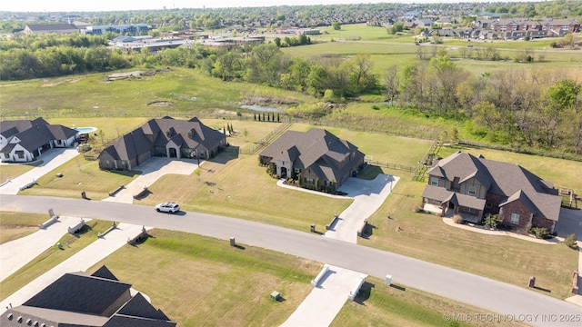 aerial view of property's location featuring nearby suburban area