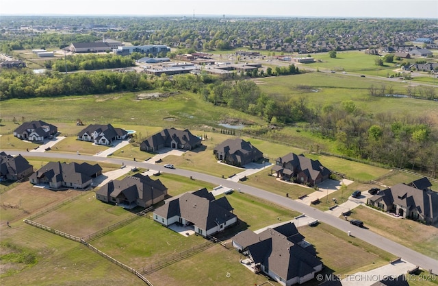 aerial overview of property's location featuring nearby suburban area