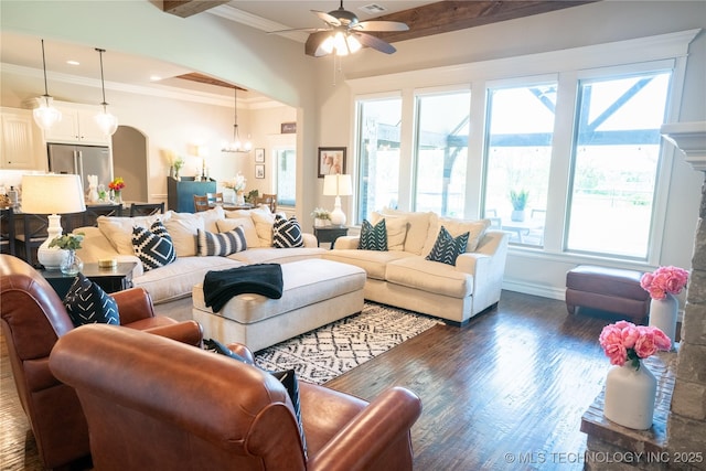 living room with ornamental molding, a ceiling fan, dark wood-style floors, a chandelier, and beam ceiling