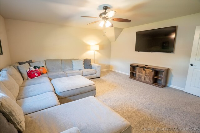 8342 N 149th E Ave, Owasso, OK 74055 - carpeted living area with ceiling fan, baseboards, and lofted ceiling