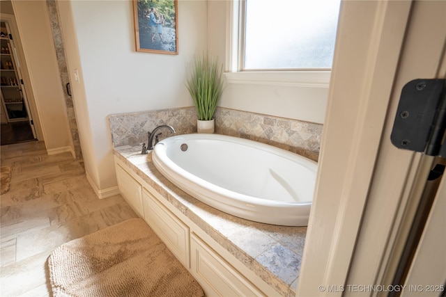 full bath featuring a bath