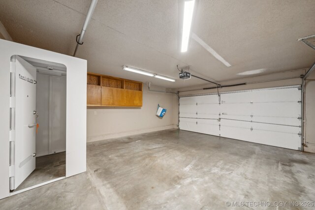 1405 W Huntsville St, Broken Arrow, OK 74011 - garage featuring a garage door opener