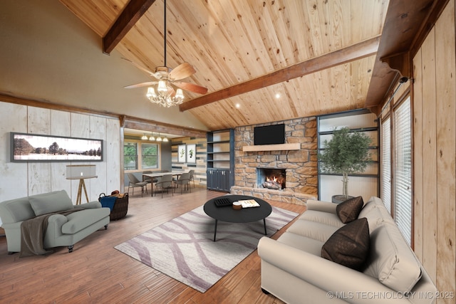living area featuring wood ceiling, wood-type flooring, ceiling fan, and a fireplace