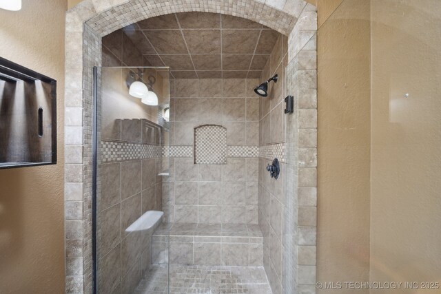 1405 W Huntsville St, Broken Arrow, OK 74011 - full bathroom with a stall shower and a textured wall