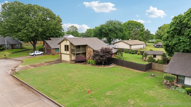 1405 W Huntsville St, Broken Arrow, OK 74011 - view of front of property with asphalt driveway, a garage, and a residential view