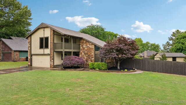 mid-century modern home with a balcony, asphalt driveway, stone siding, and an attached garage