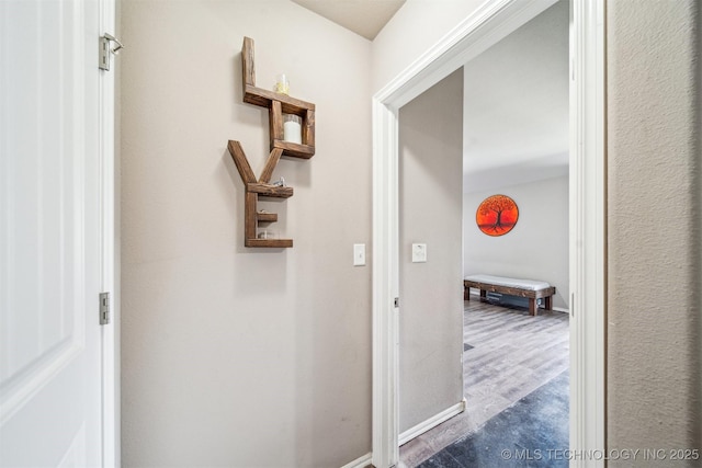 corridor with dark wood-type flooring