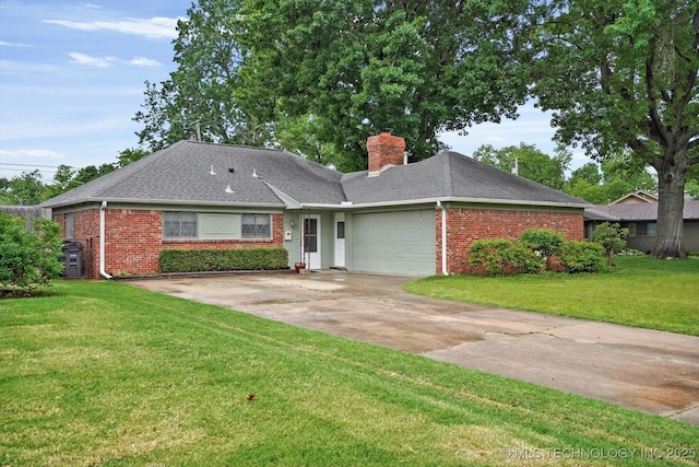 single story home featuring brick siding, a chimney, a garage, and a front yard