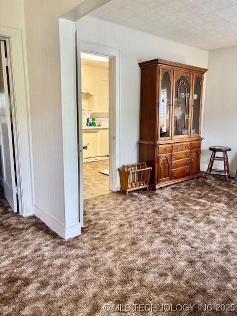 interior space featuring carpet