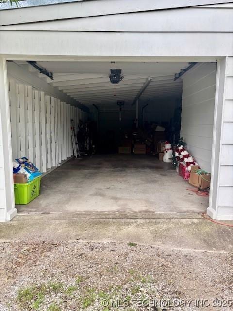 garage featuring driveway