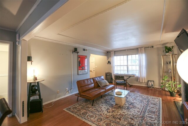 5518 E 46th St Unit 5518, Tulsa, OK 74135 - living area with wood finished floors, crown molding, and baseboards