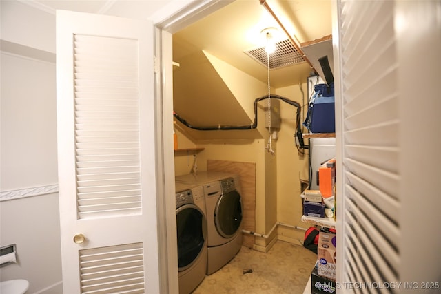 5518 E 46th St Unit 5518, Tulsa, OK 74135 - laundry room featuring washer and dryer, light floors, and baseboards
