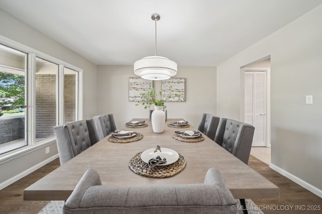 4031 S Birmingham Ave, Tulsa, OK 74105 - dining area featuring baseboards and dark wood-style flooring