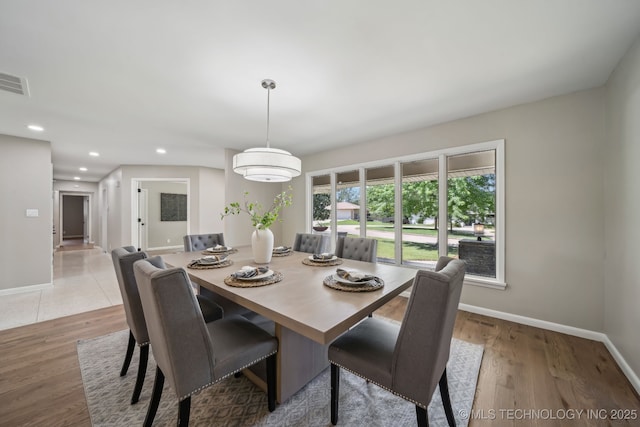 4031 S Birmingham Ave, Tulsa, OK 74105 - dining area with baseboards, recessed lighting, and light wood-style floors