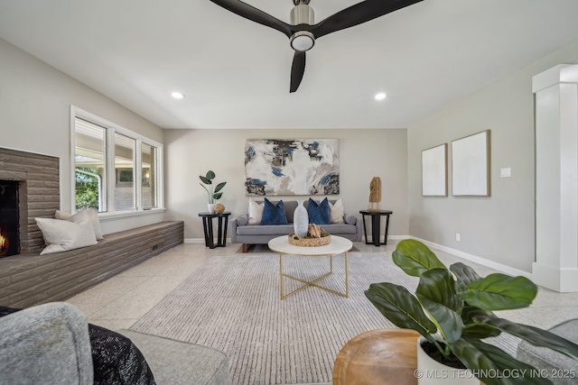 4031 S Birmingham Ave, Tulsa, OK 74105 - living room featuring baseboards, ceiling fan, recessed lighting, and a lit fireplace