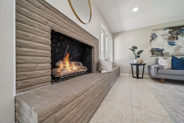 4031 S Birmingham Ave, Tulsa, OK 74105 - living room featuring baseboards, a brick fireplace, and recessed lighting