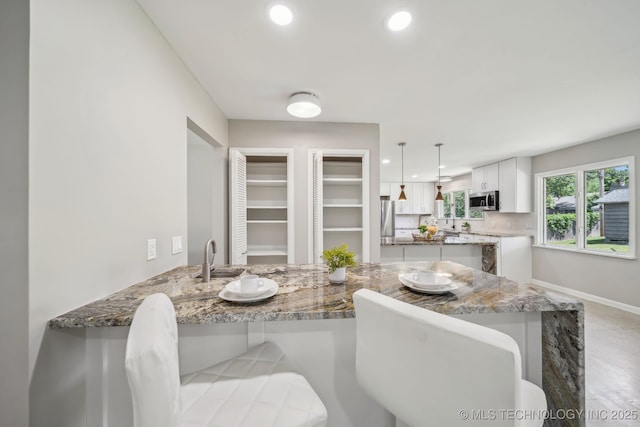 4031 S Birmingham Ave, Tulsa, OK 74105 - dining room featuring recessed lighting and baseboards