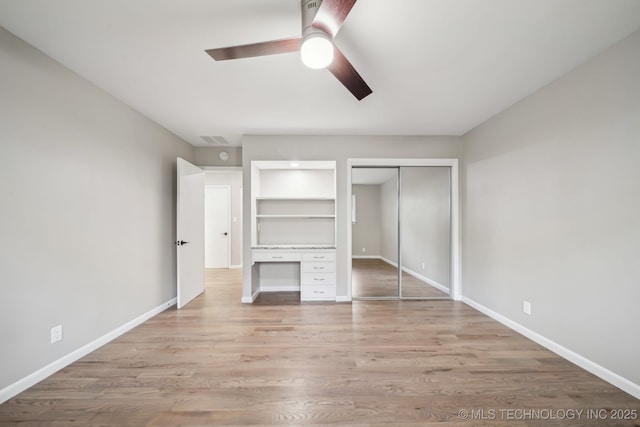 4031 S Birmingham Ave, Tulsa, OK 74105 - unfurnished bedroom featuring wood finished floors, baseboards, and ceiling fan