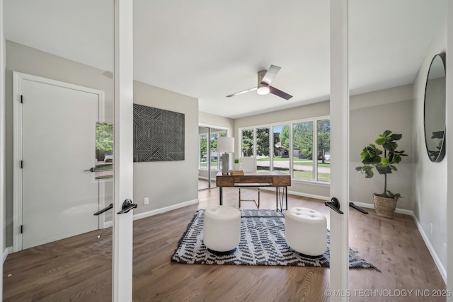 4031 S Birmingham Ave, Tulsa, OK 74105 - home office with wood finished floors, a ceiling fan, french doors, and baseboards